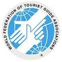 Logo of World Federation of Tourist Guid Association to ilustrate the quality of the Orsay Museum Guided Tour