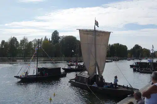 Photo of traditional boats on the Loire River during the Loire festival. Orléans, Loire Valley, France.