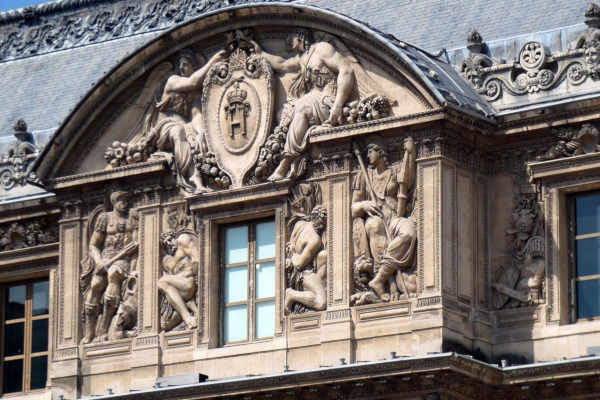 Photo of a detail of the Lescot wing facade to illustrate the Louvre private tour, Paris, France.