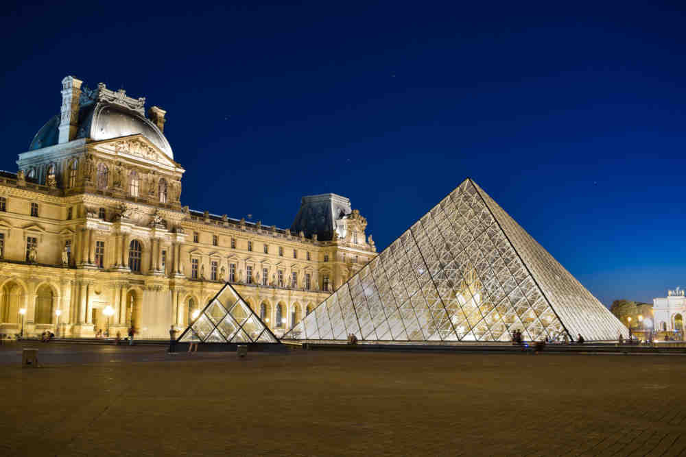 Photo of the Louvre Pyramide to illustrate the Louvre Guided Tour; Paris, France.