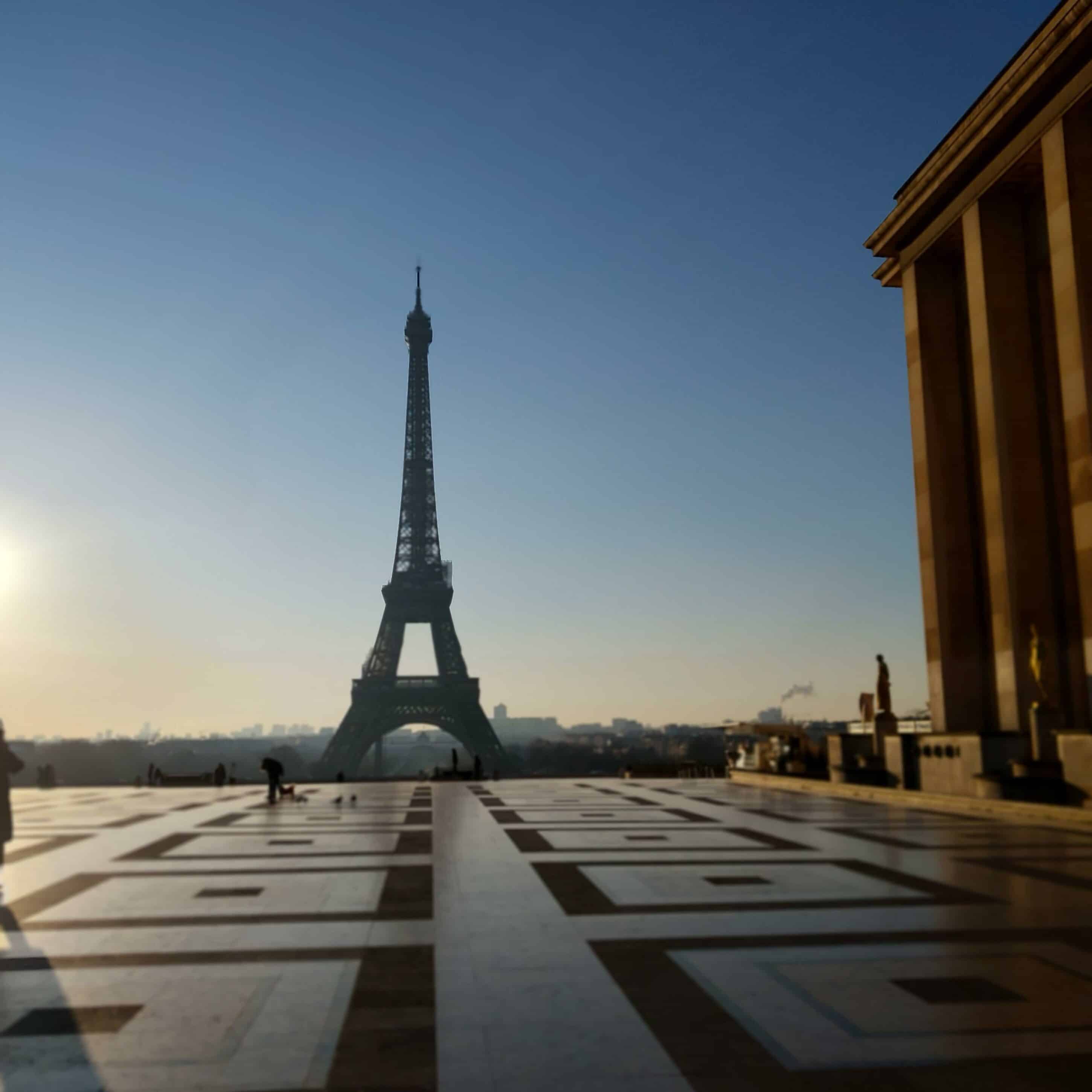 A panoramic view of Paris with the Eiffel Tower in the background