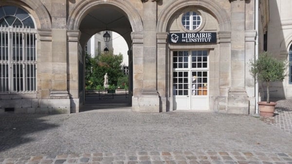 Statue of Voltaire in Square Honore Champion from Institut de France