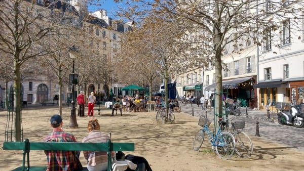 Place Dauphine one of the five Royal Square of Paris to illustrate the Île de la Cité Walking Tour in Paris, France.