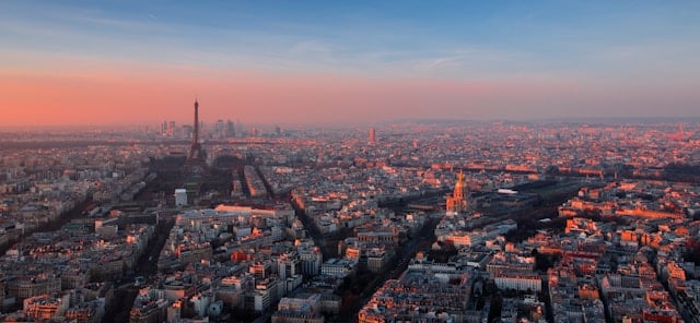View of the Eiffel Tower at sunset, symbolizing a perfect end to a Paris trip