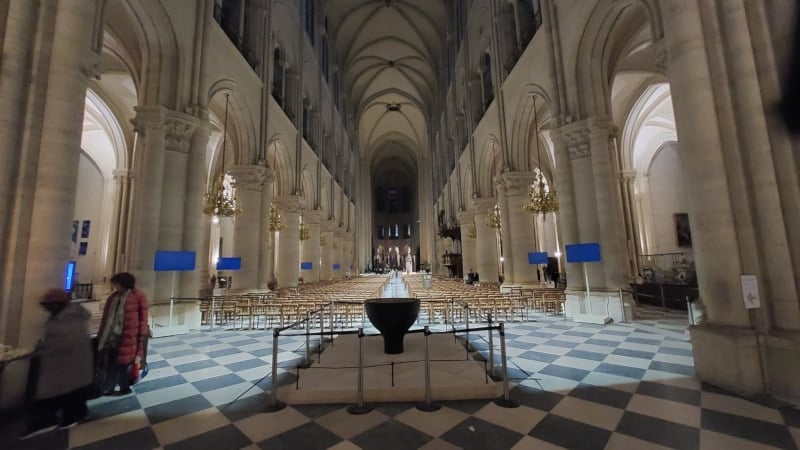 View of Notre-Dame nave from the cathedral western entry in early 2025, just after its December 2024 reopening. Paris, France.