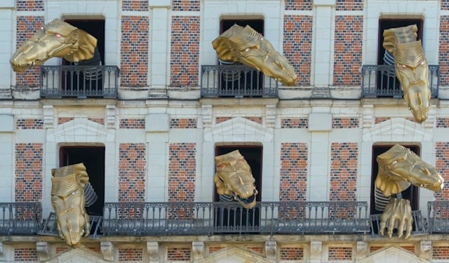 The six-headed hydra animating the facade of the house of magic in Blois, Loire Valley, France